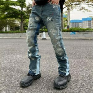 edgy ripped jeans with ink splash urban streetwear icon 5451