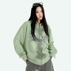 youthful zip up hoodie with cross detail   street chic 7150